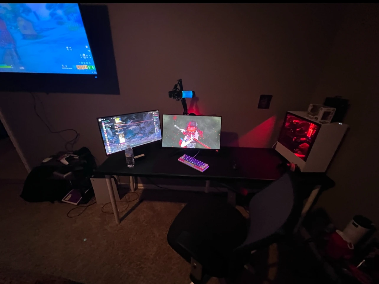 A photo of Armaan's gaming setup where he spends most his time gaming and completing his work and assignments. 